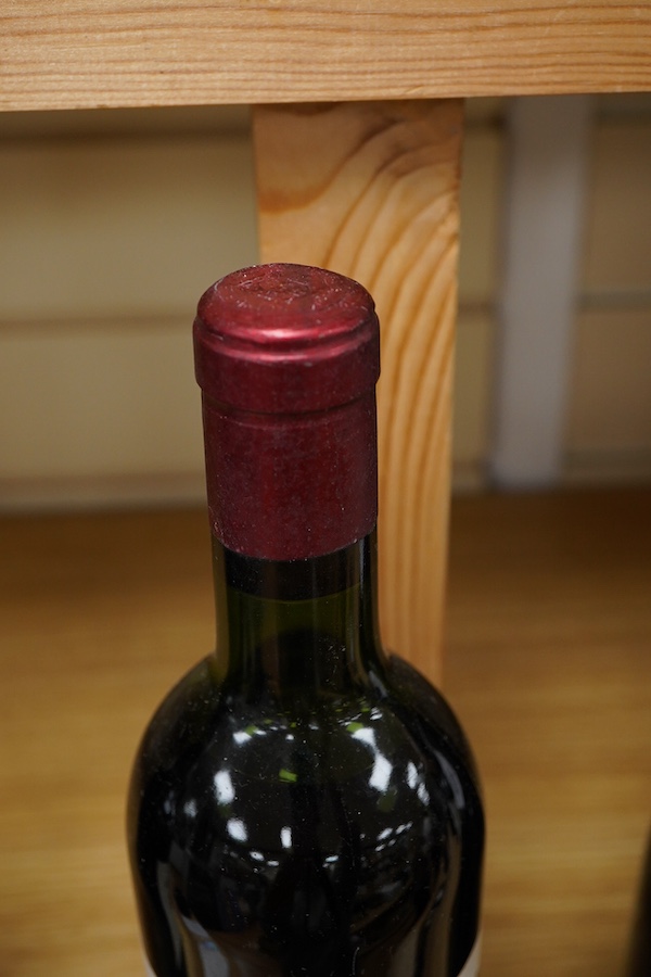 A bottle of Chateau Cheval Blanc Saint Emilion 1er Grand Cru Classé, 1964
